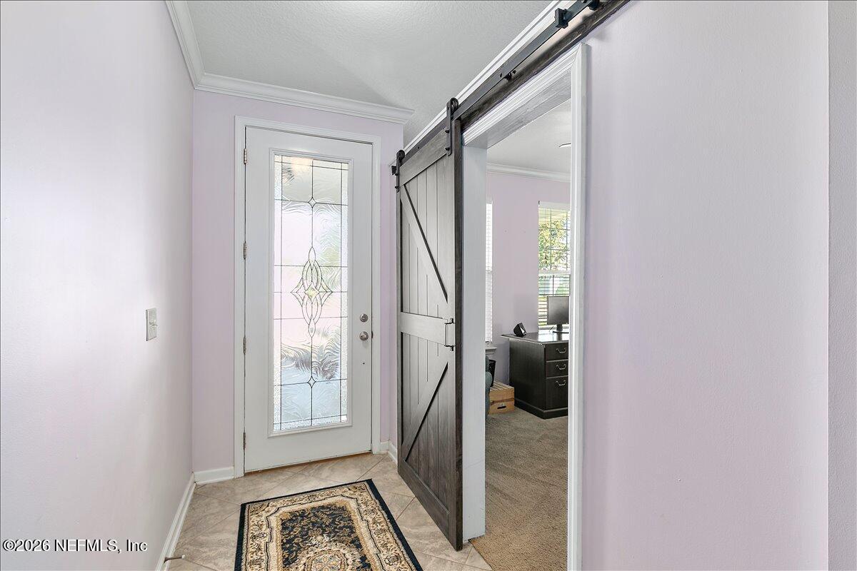 53 Monroe Avenue St. Augustine, FL 32086 - Photo 3 of 26 a view of hallway with walk in closet and bathroom