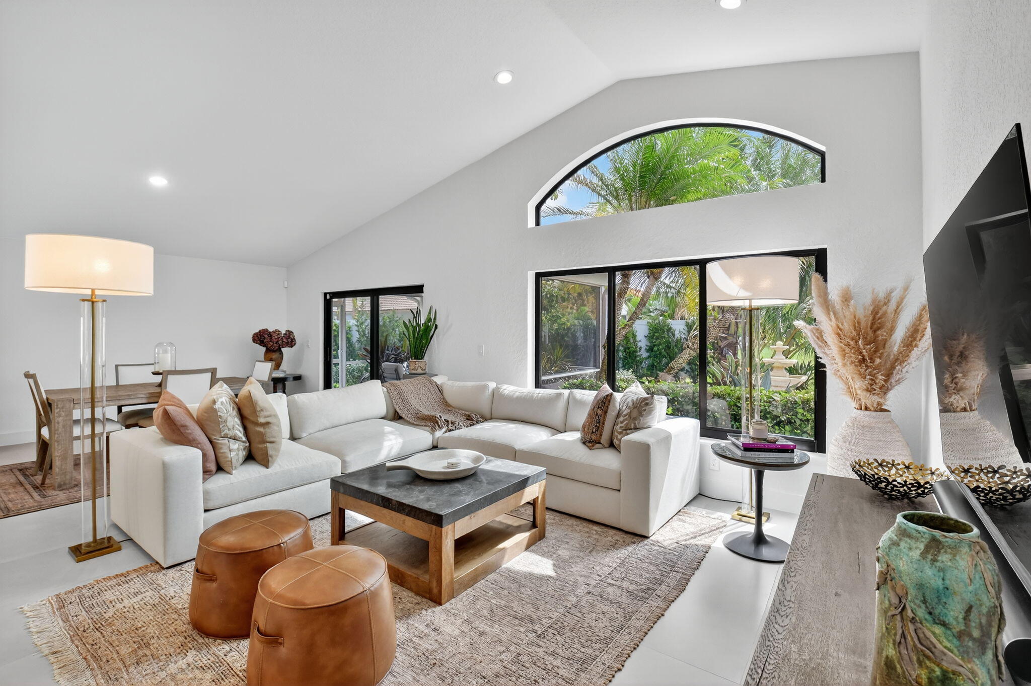 1175 Sea Grape Circle Delray Beach, FL 33445 - Photo 23 of 64 a living room with fireplace furniture and a large window