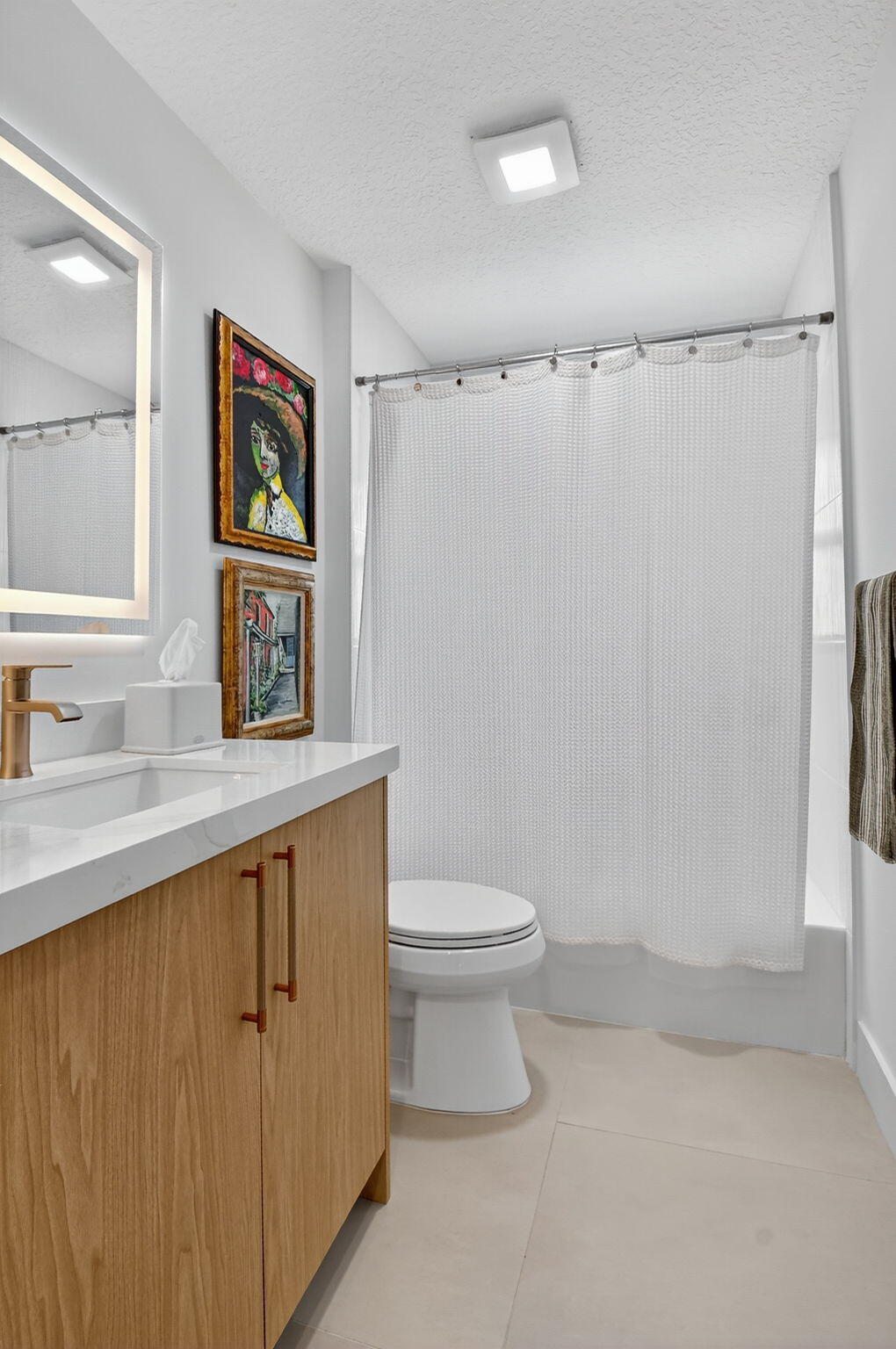 1175 Sea Grape Circle Delray Beach, FL 33445 - Photo 36 of 64 a bathroom with a sink mirror vanity and toilet