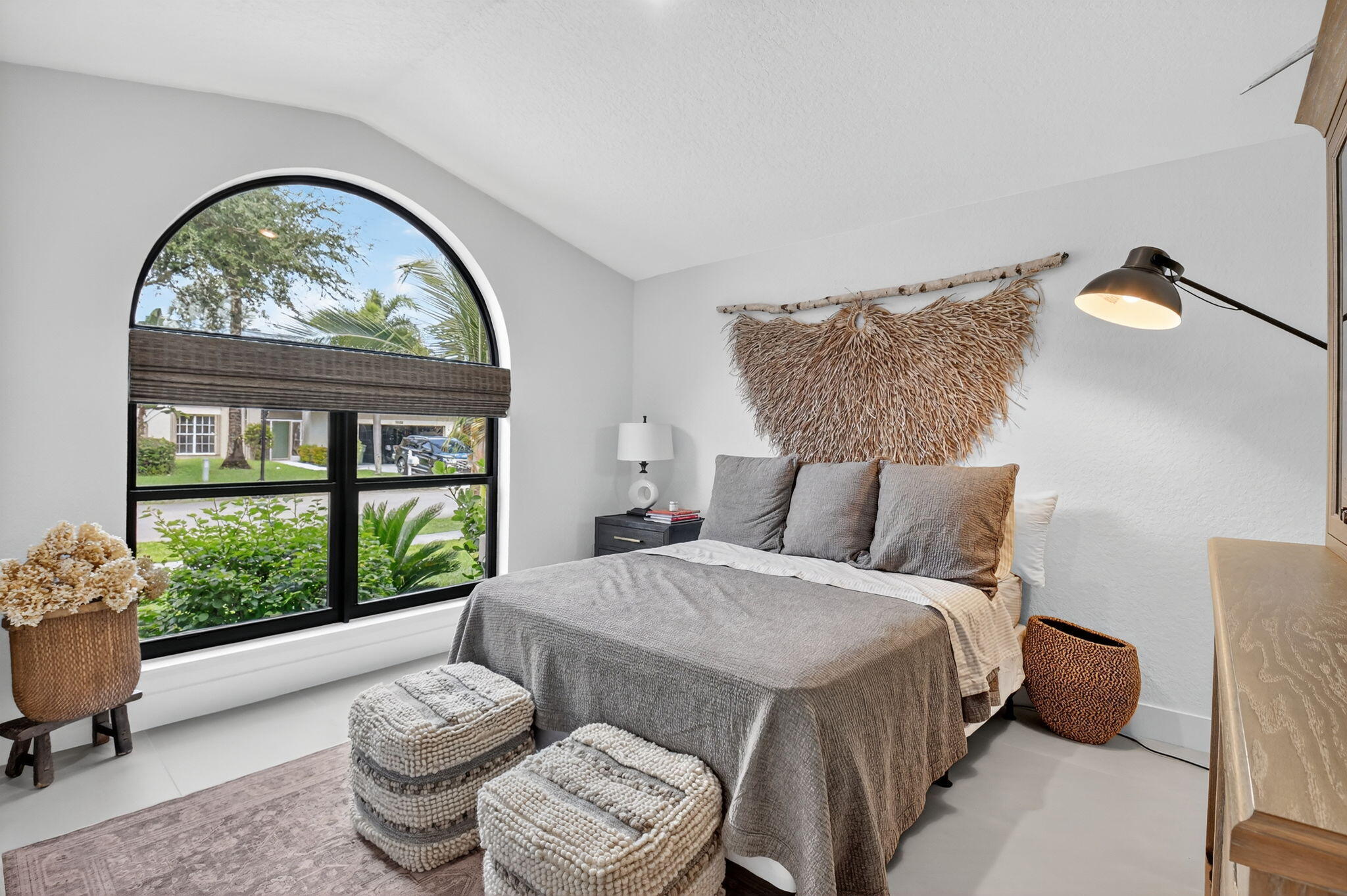 1175 Sea Grape Circle Delray Beach, FL 33445 - Photo 37 of 64 a spacious bedroom with a bed and a large window