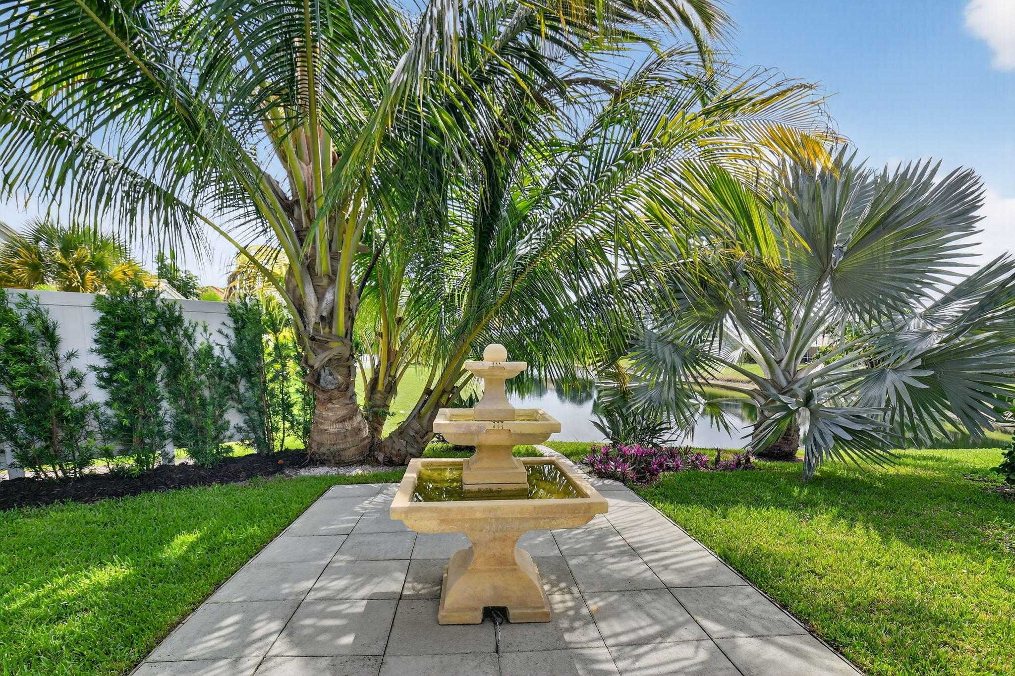 1175 Sea Grape Circle Delray Beach, FL 33445 - Photo 48 of 64 a front view of a house with garden