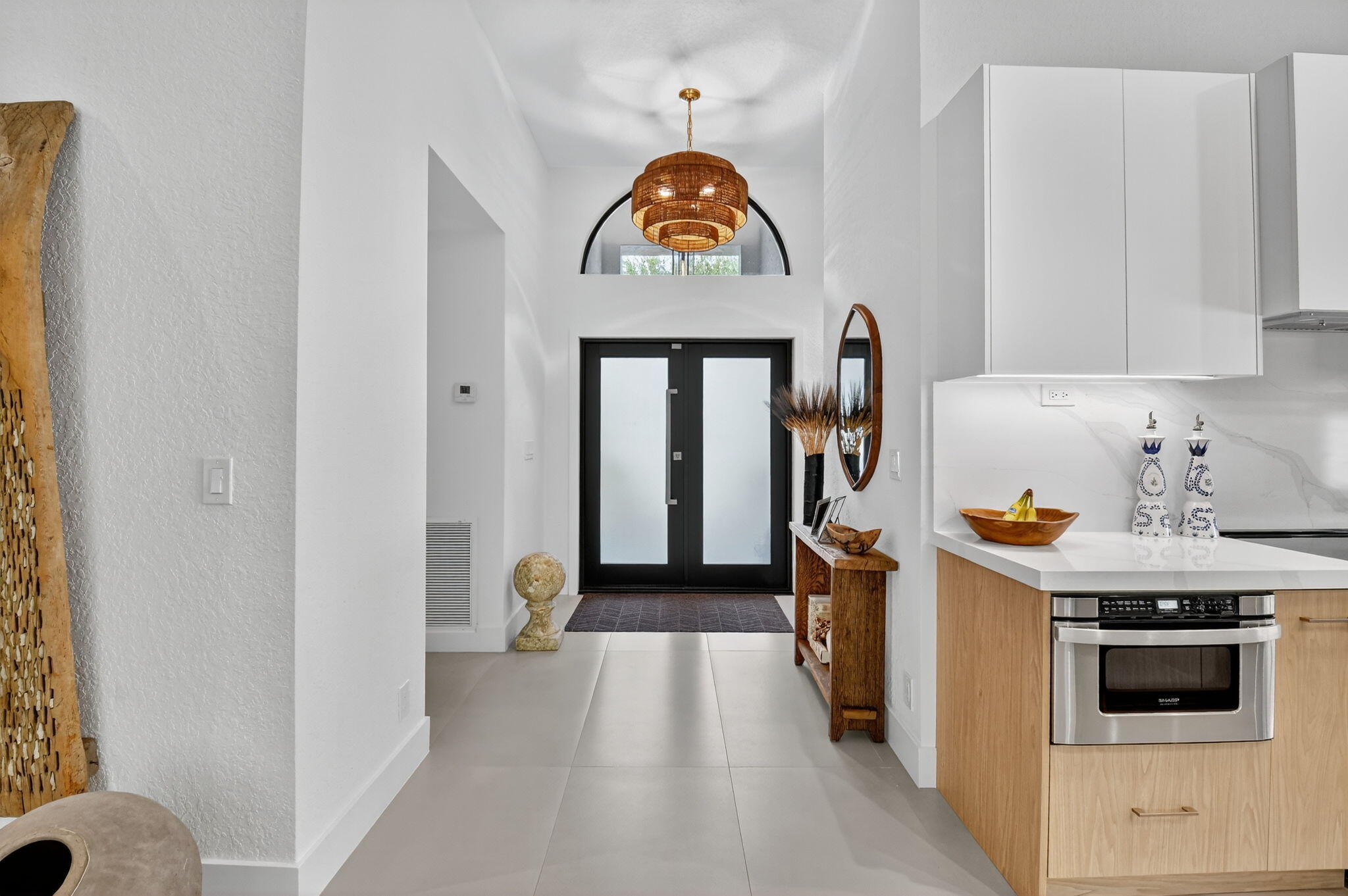 1175 Sea Grape Circle Delray Beach, FL 33445 - Photo 5 of 64 a view of a kitchen with a sink and dishwasher kitchen view