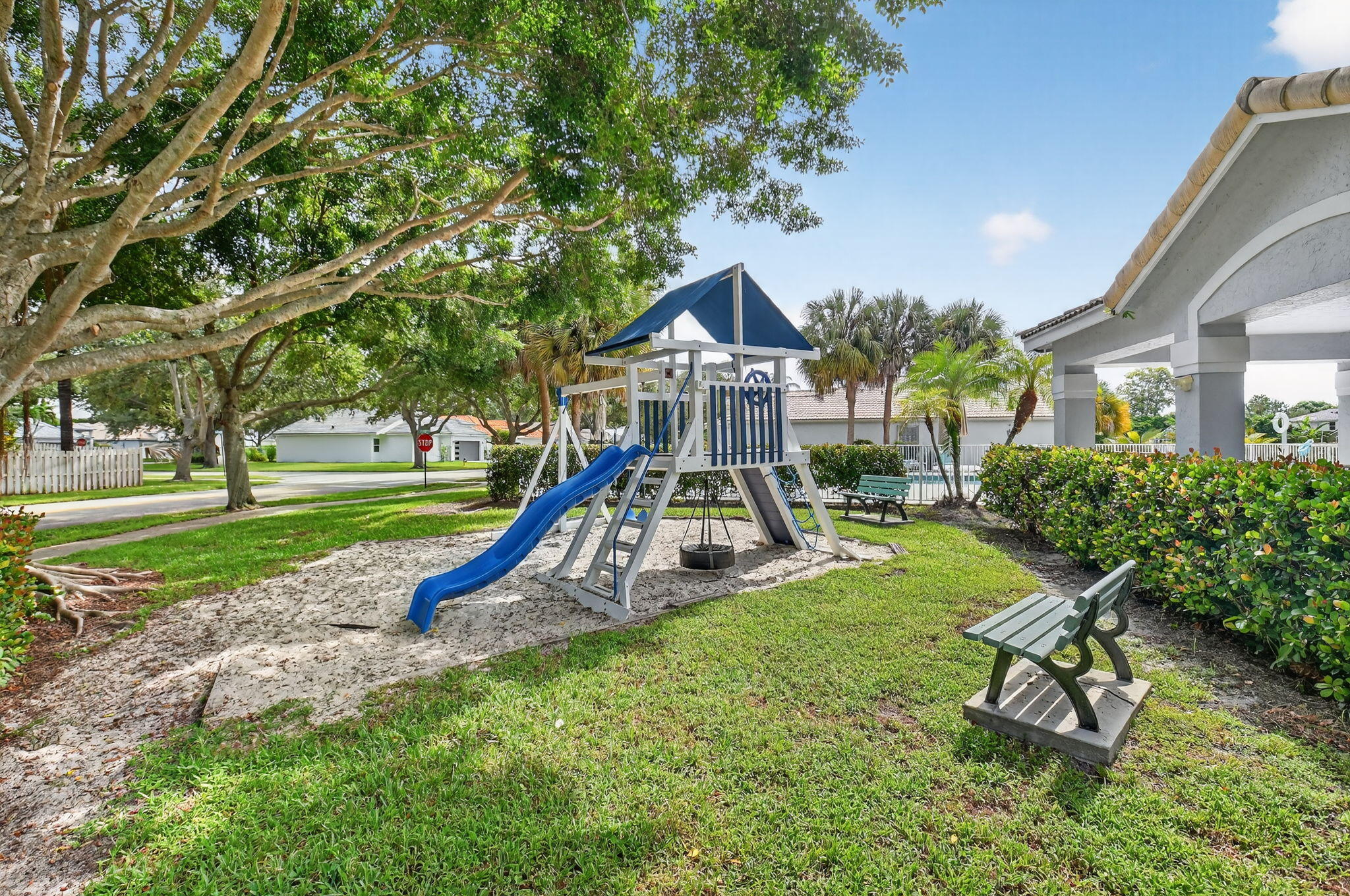 1175 Sea Grape Circle Delray Beach, FL 33445 - Photo 55 of 64 a view of a house with a yard patio and slide
