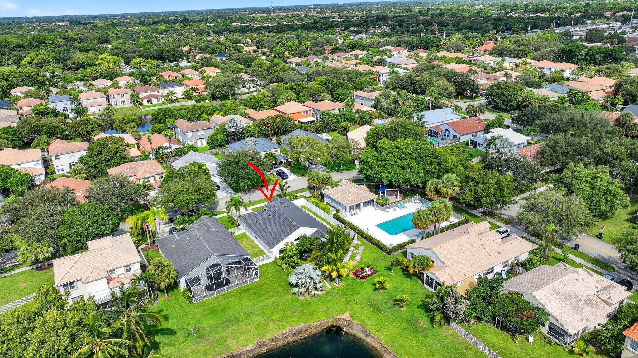 1175 Sea Grape Circle Delray Beach, FL 33445 - Photo 58 of 64 an aerial view of residential houses with outdoor space and street view