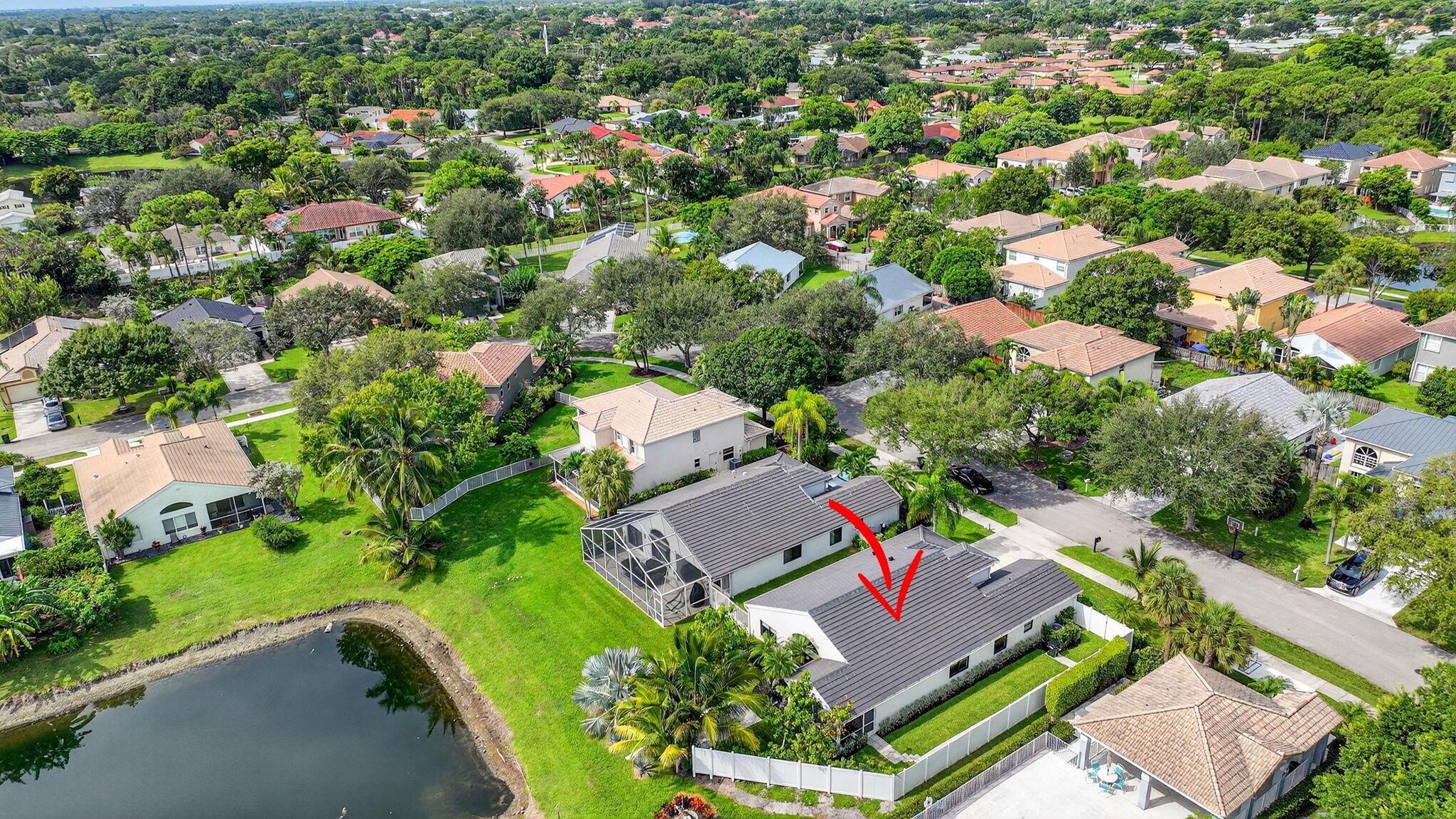 1175 Sea Grape Circle Delray Beach, FL 33445 - Photo 59 of 64 an aerial view of residential houses with outdoor space and street view