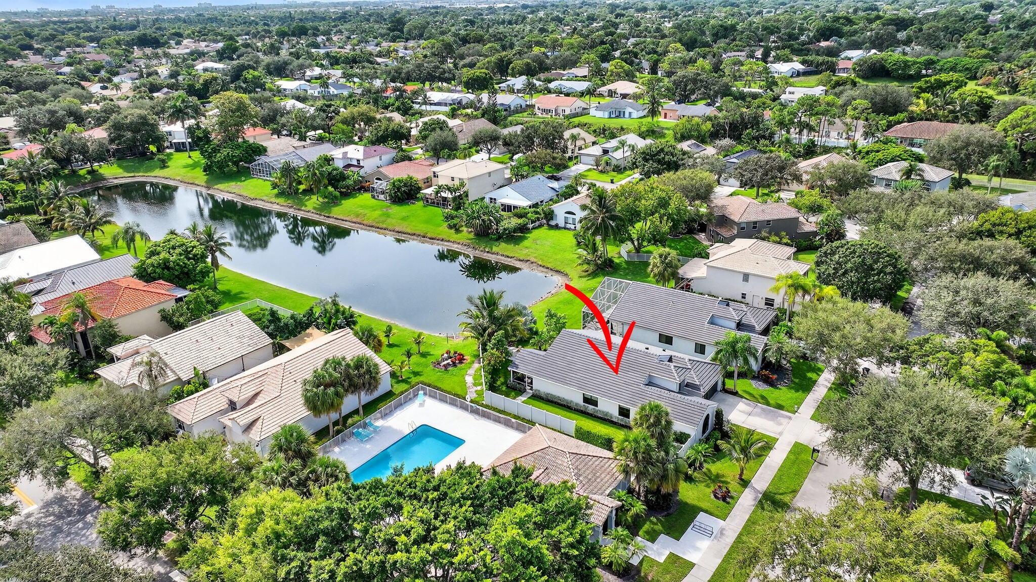 1175 Sea Grape Circle Delray Beach, FL 33445 - Photo 60 of 64 an aerial view of residential house with outdoor space and swimming pool