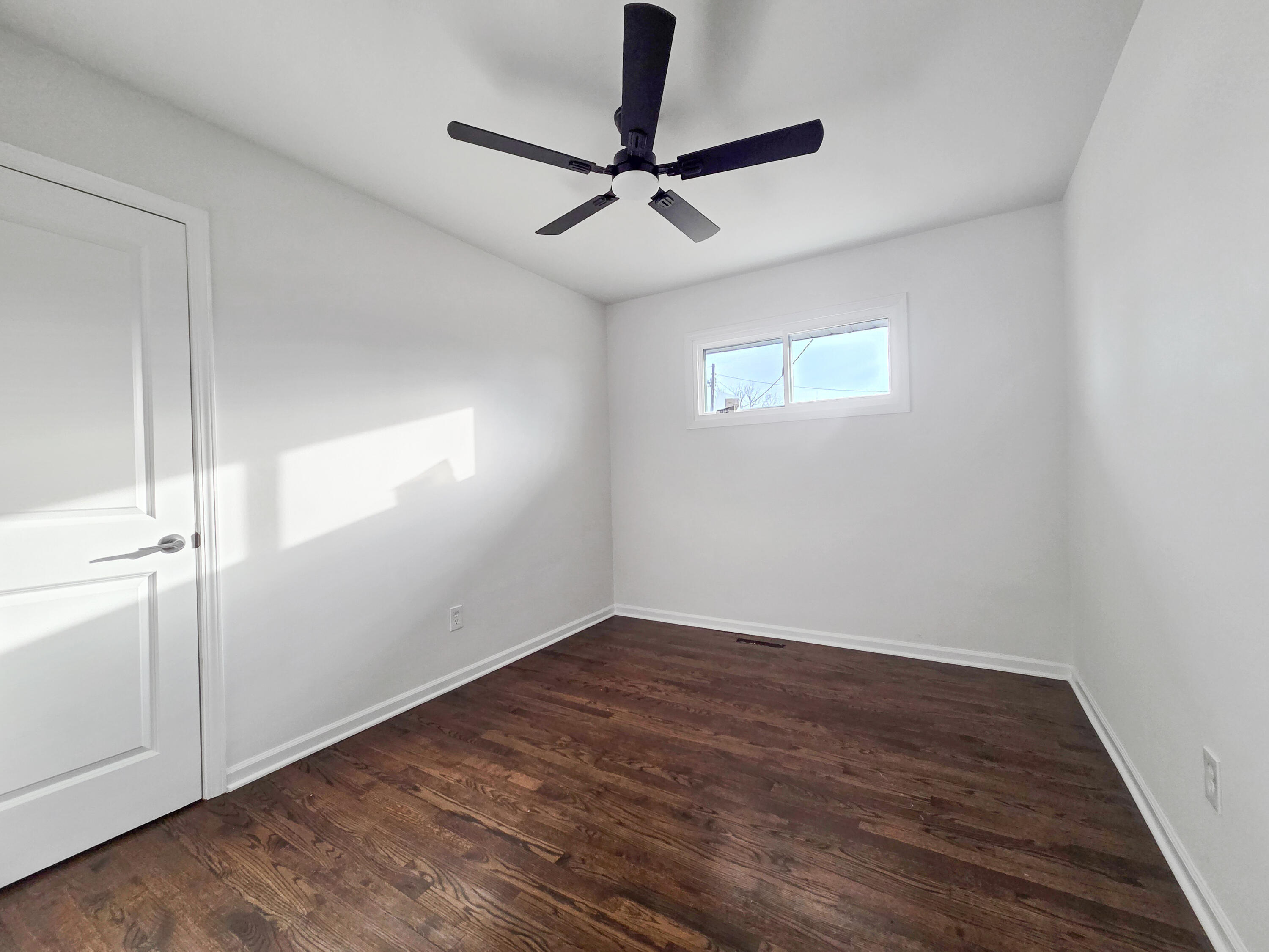 1629 Tennessee Street Gary, IN 46407 - Photo 12 of 26 wooden floor in an empty room