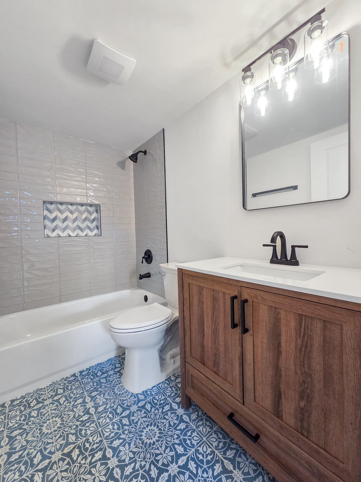 1629 Tennessee Street Gary, IN 46407 - Photo 19 of 26 a bathroom with a double vanity sink mirror and toilet
