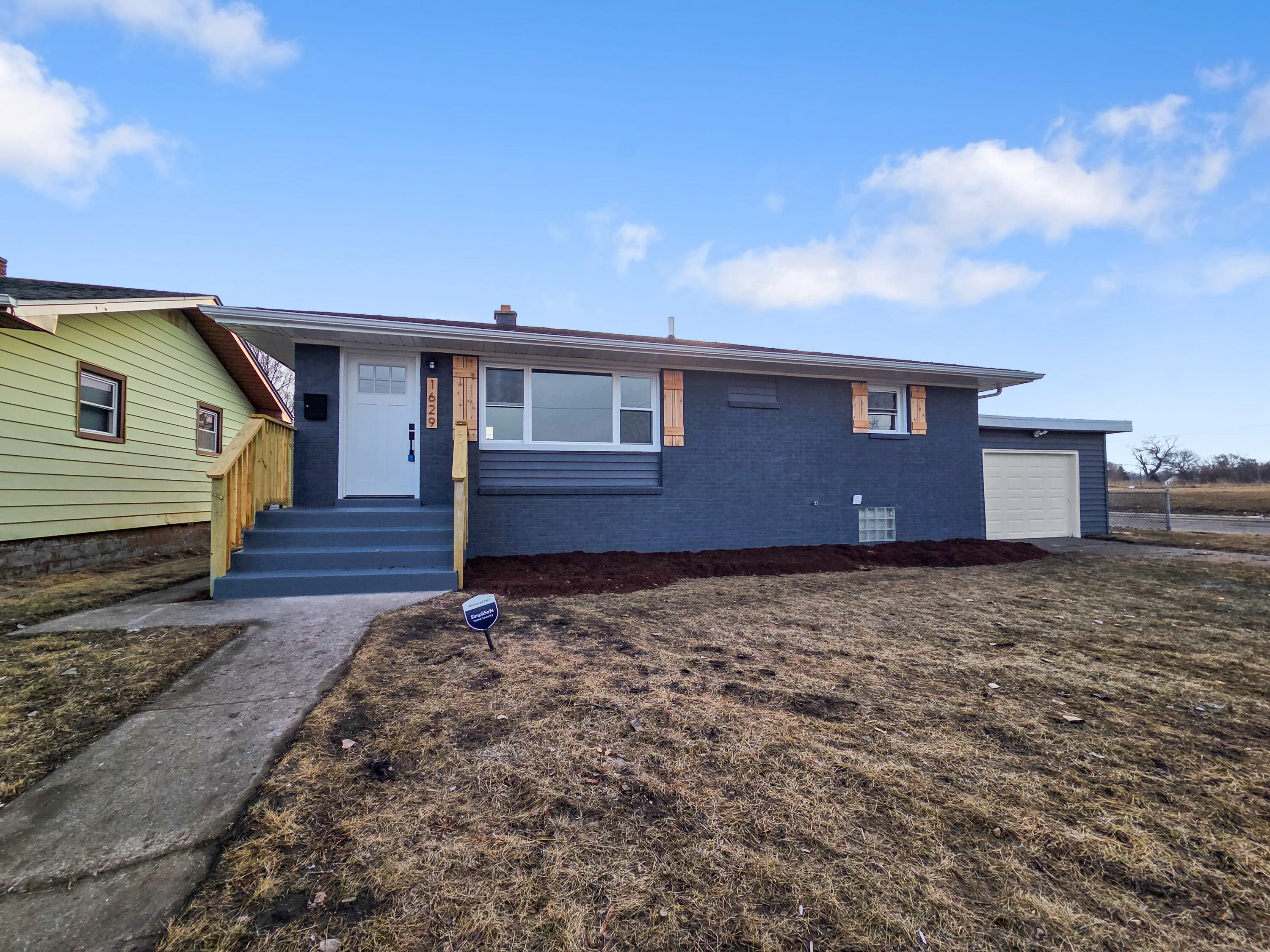 1629 Tennessee Street Gary, IN 46407 - Photo 23 of 26 a house view with a backyard space