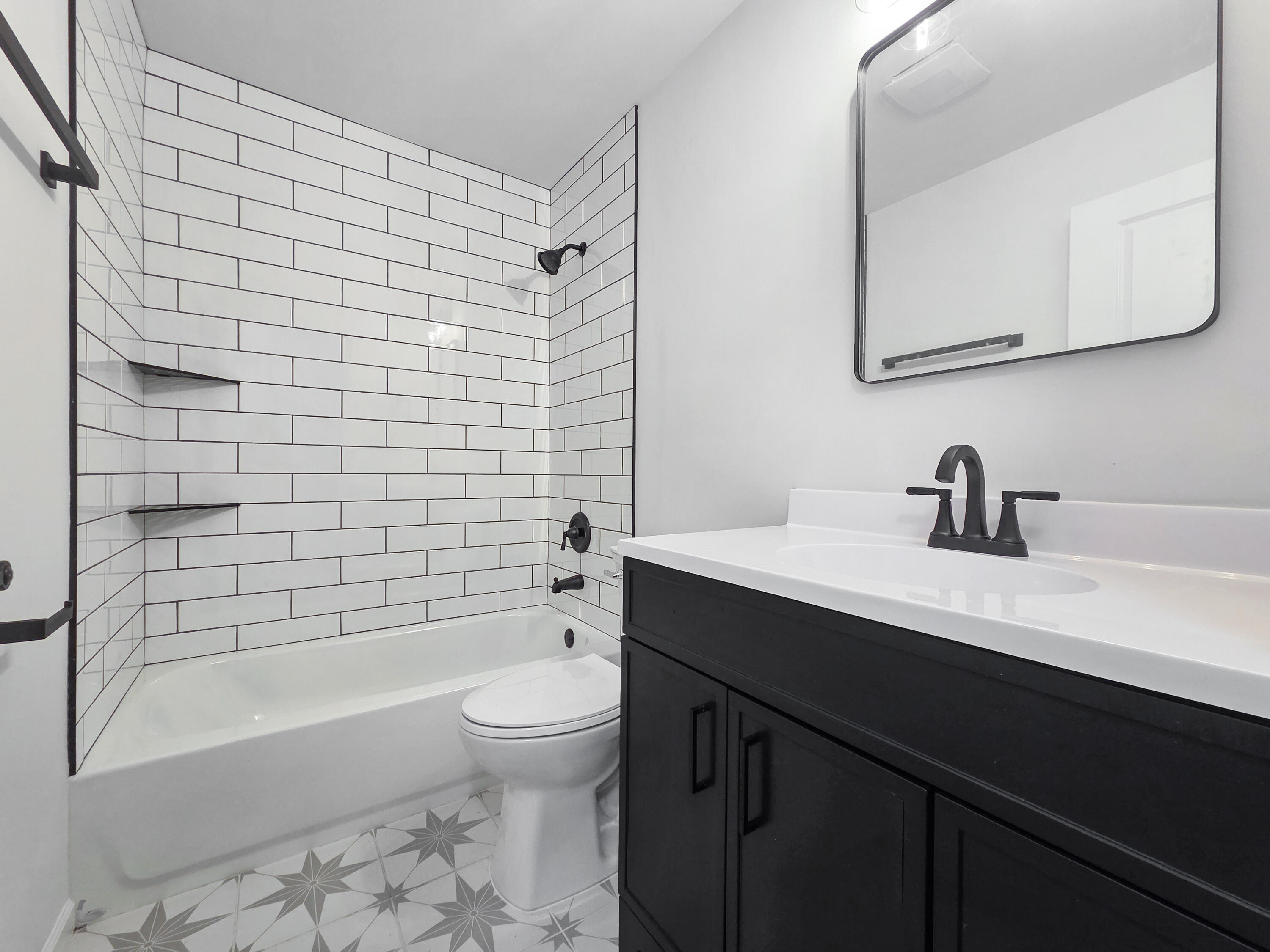 1629 Tennessee Street Gary, IN 46407 - Photo 5 of 26 a bathroom with a sink a toilet and shower