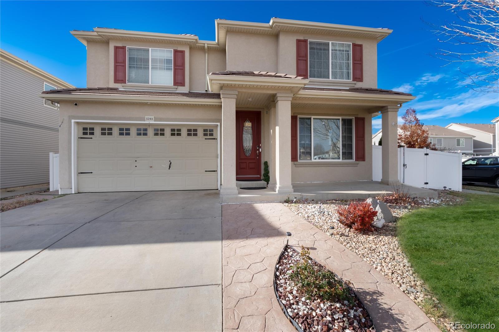 5293 Malaya Street Denver, CO 80249 - Photo 1 of 44 a front view of a house