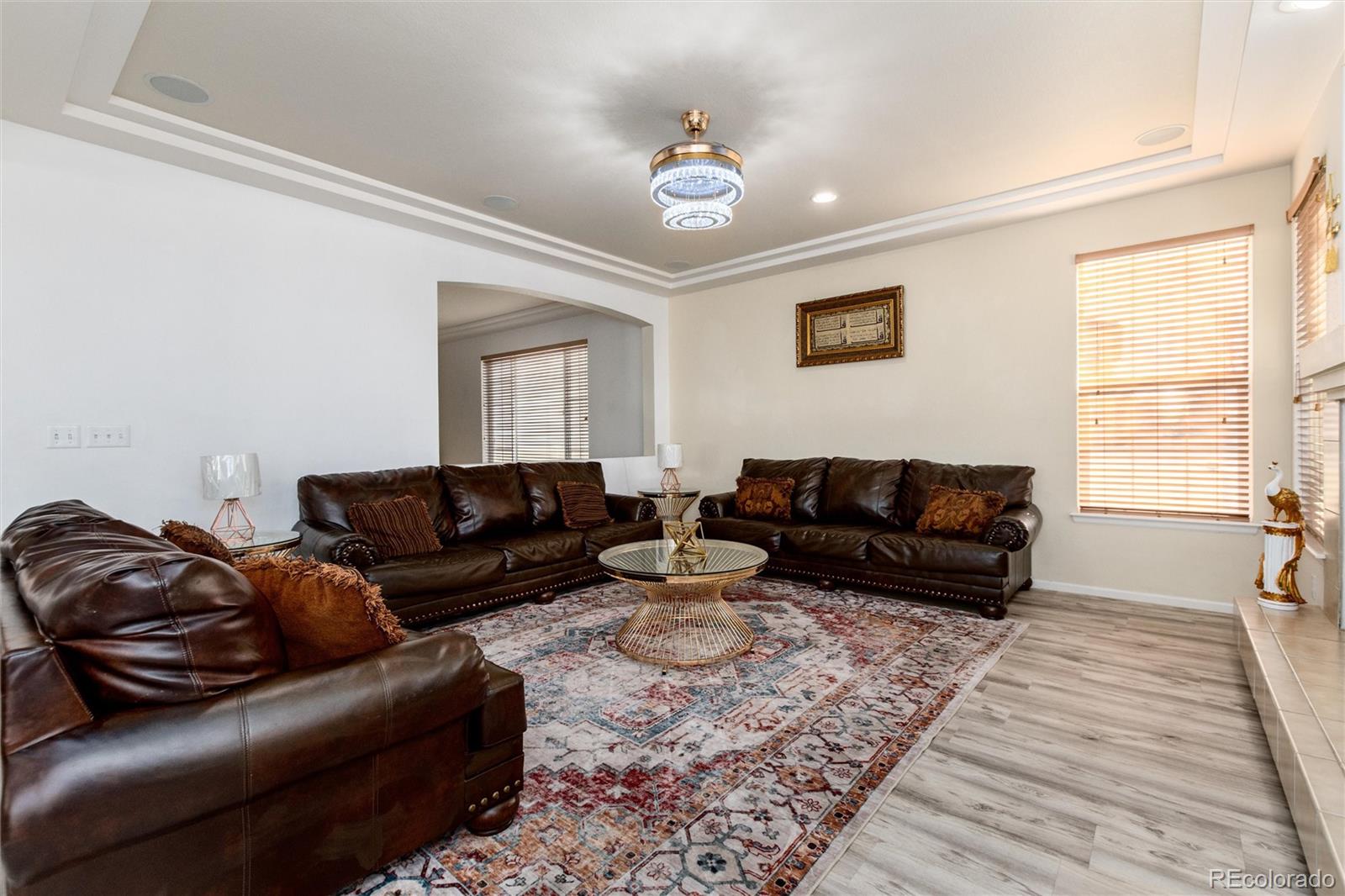 5293 Malaya Street Denver, CO 80249 - Photo 15 of 44 a living room with furniture and a window