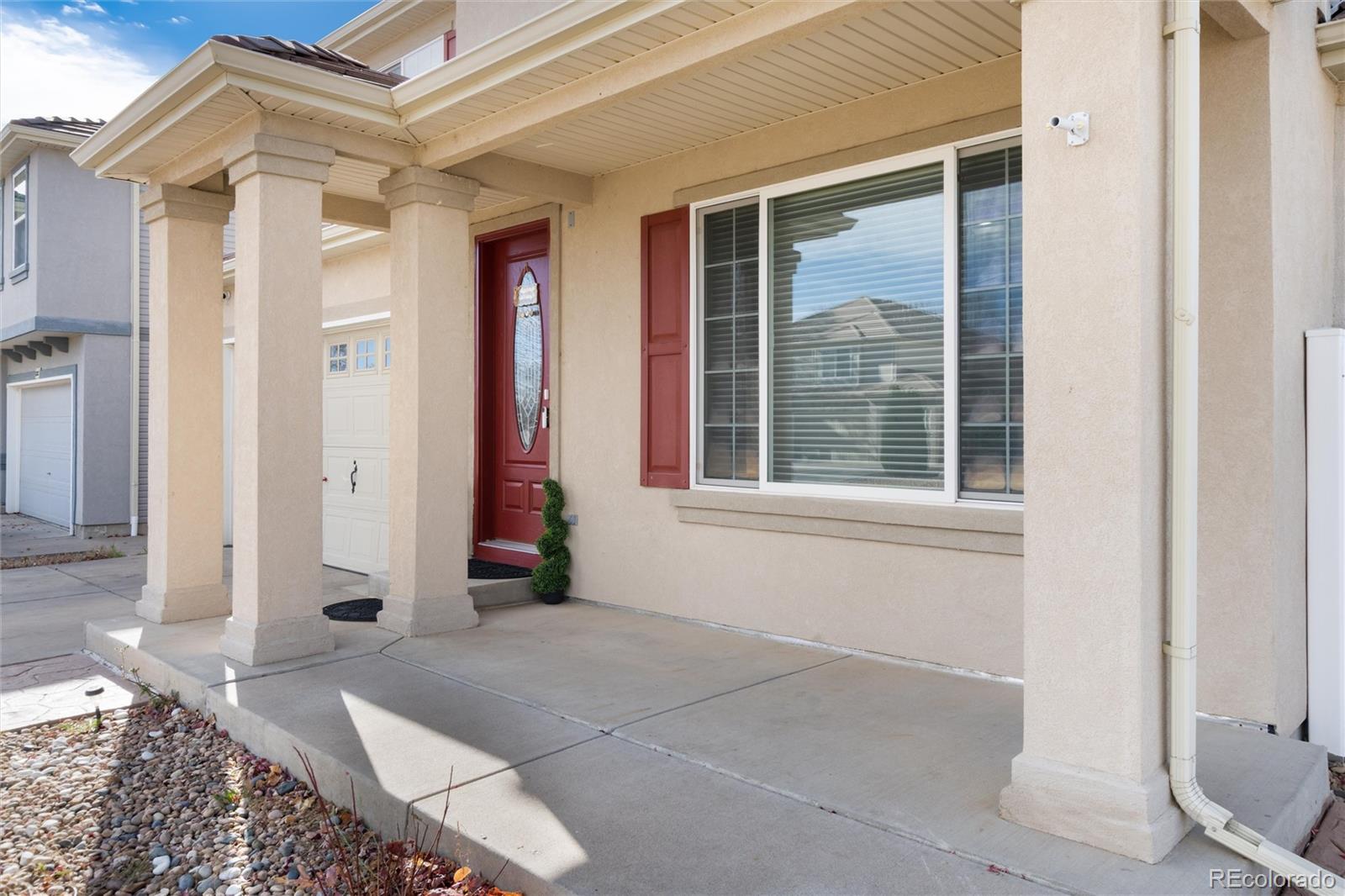 5293 Malaya Street Denver, CO 80249 - Photo 4 of 44 a view of an entryway of house