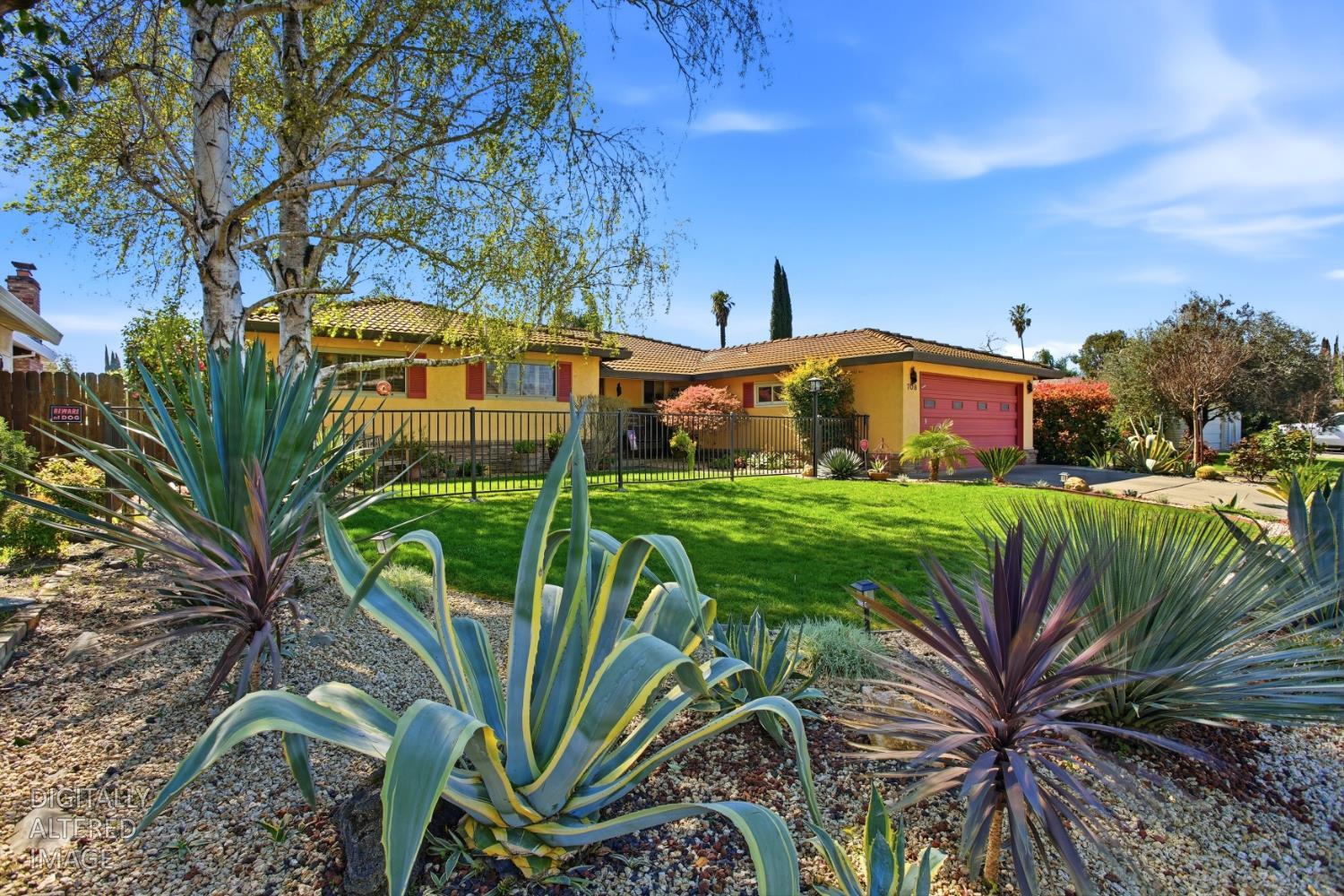 708 Clipper Way Sacramento, CA 95831 - Photo 1 of 1 a front view of a house with garden
