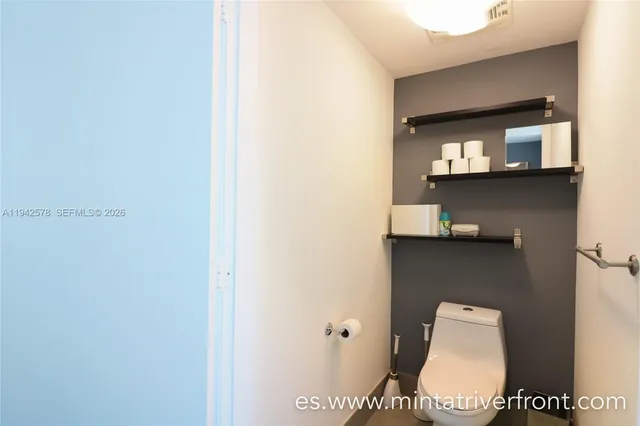 a bathroom with a toilet