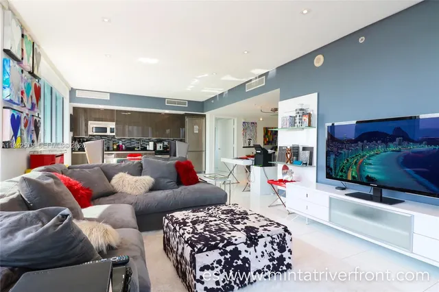 a living room with furniture and a couch