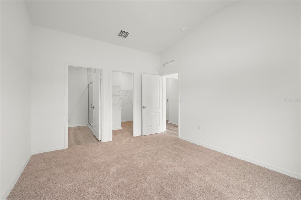 13438 Leaping Water Way Astatula, FL 34705 - Photo 11 of 18 a view of an empty room