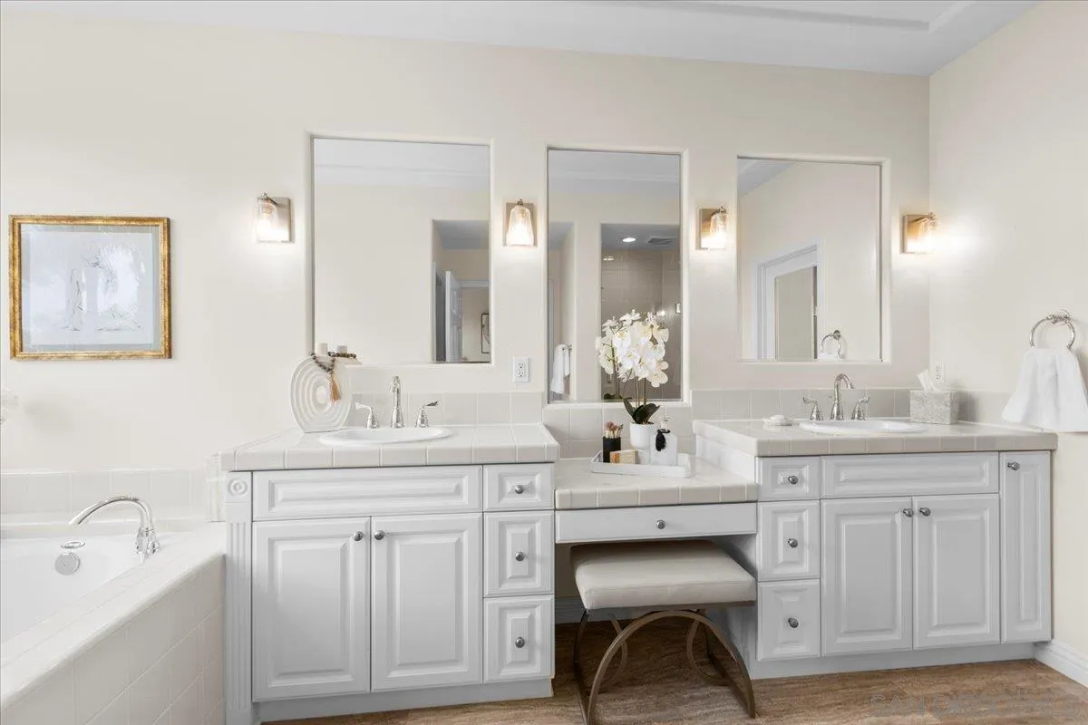 622 Brae Mar Court Encinitas, CA 92024 - Photo 16 of 24 a spacious bathroom with a sink and a mirror