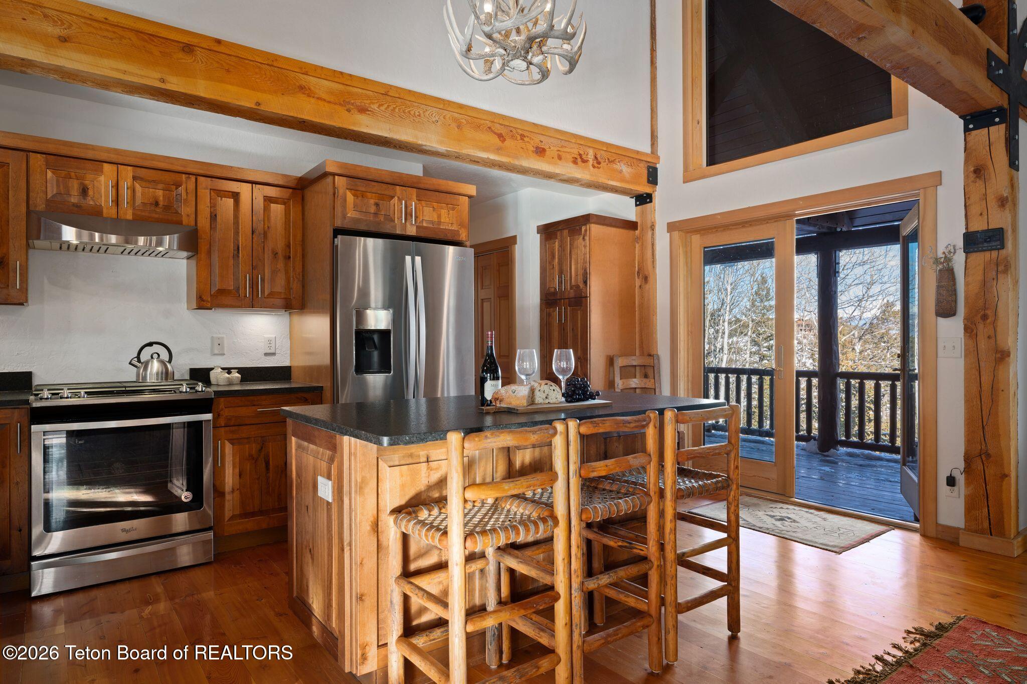 5450 Dry Henderson Road Victor, ID 83455 - Photo 14 of 40 Deck Access From Kitchen