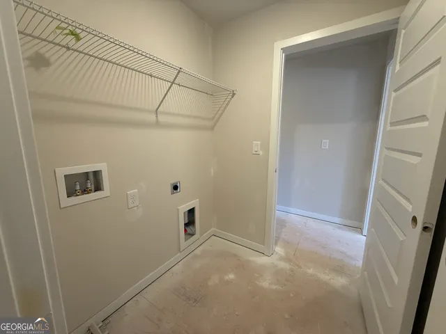 a bathroom with a tub sink double vanity and a mirror