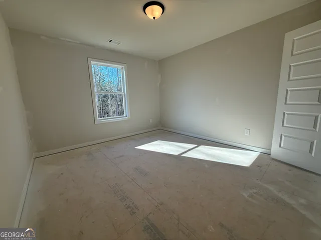 an empty room with closet