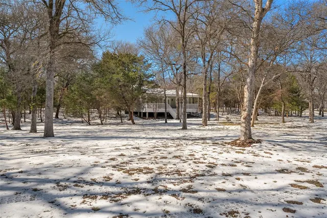 a view of road with trees
