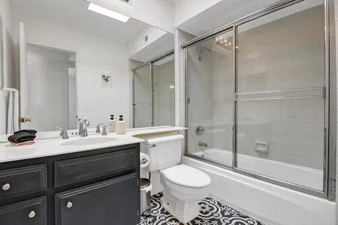 a view of a swimming pool with a patio