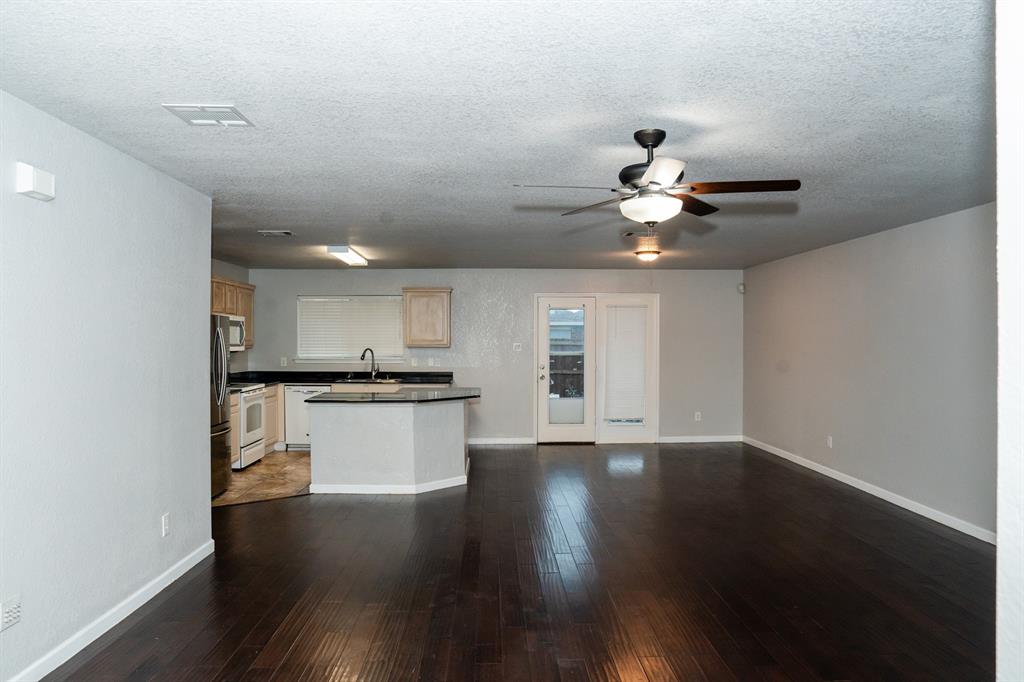 2129 Bliss Road Fort Worth, TX 76177 - Photo 7 of 22 a view of kitchen with sink microwave and stove