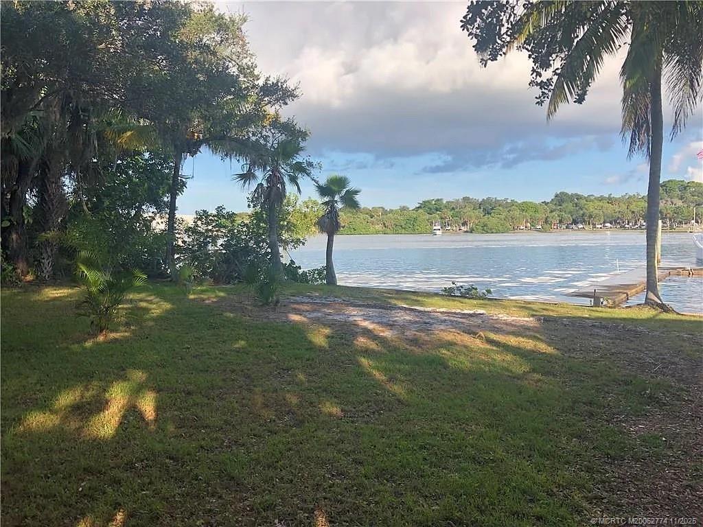 4605 Southeast Williams Way Stuart, FL 34997 - Photo 2 of 7 a view of an outdoor space and a yard