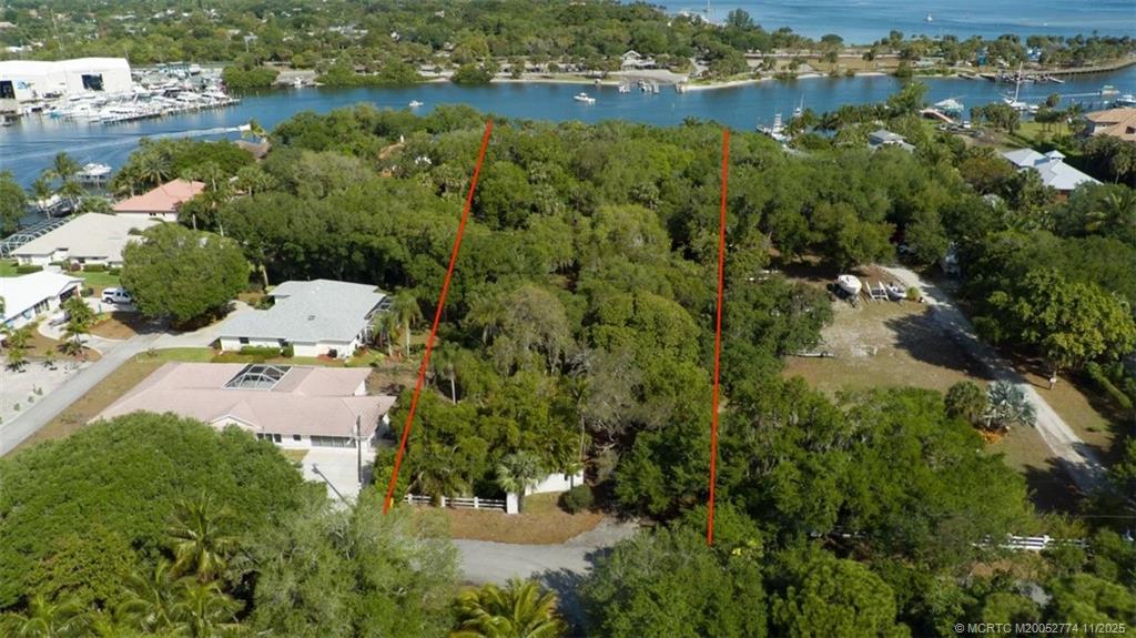 4605 Southeast Williams Way Stuart, FL 34997 - Photo 6 of 7 an aerial view of residential houses with outdoor space and river