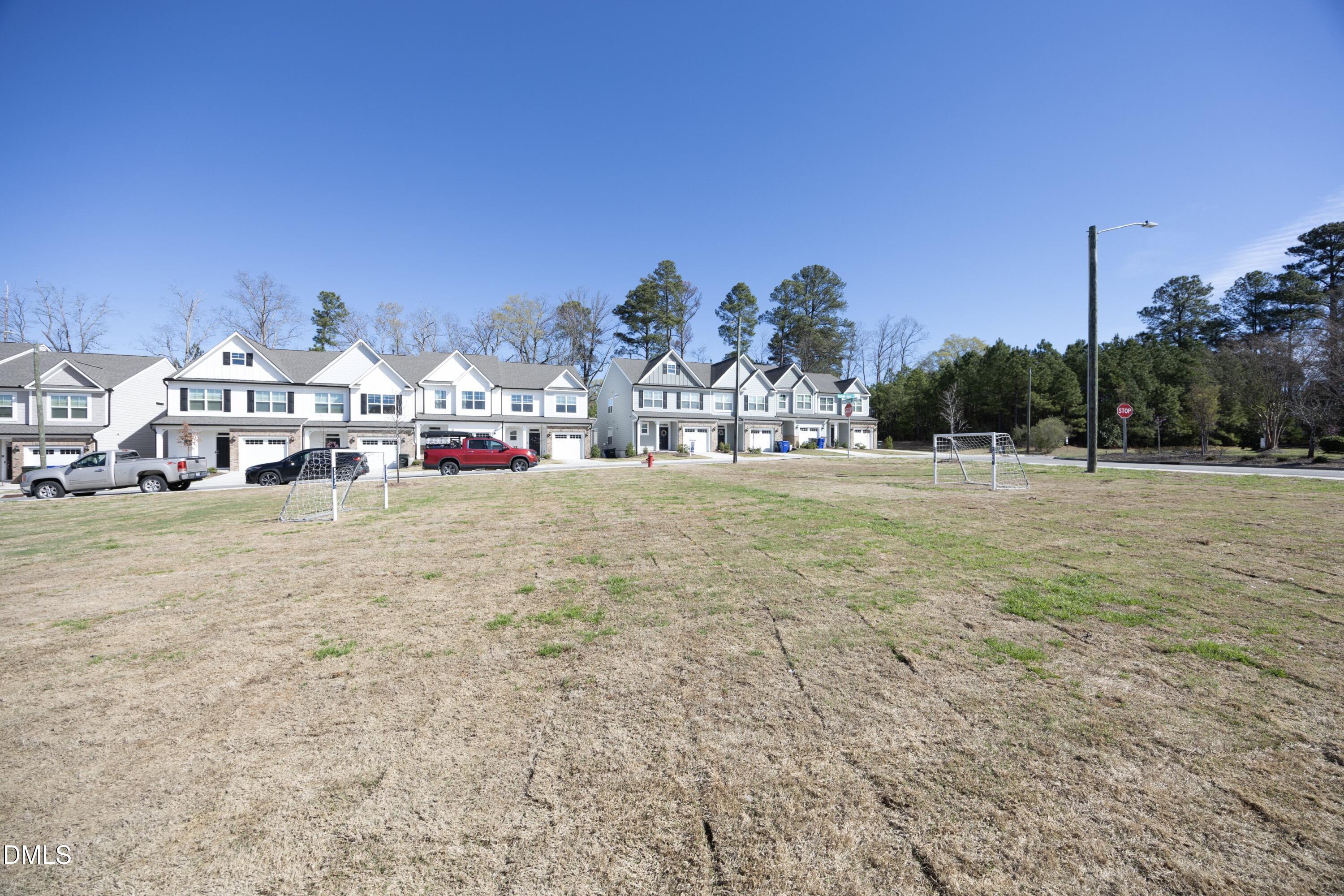 1002 Heartstone Way Durham, NC 27713 - Photo 28 of 35 a view of a houses with city view