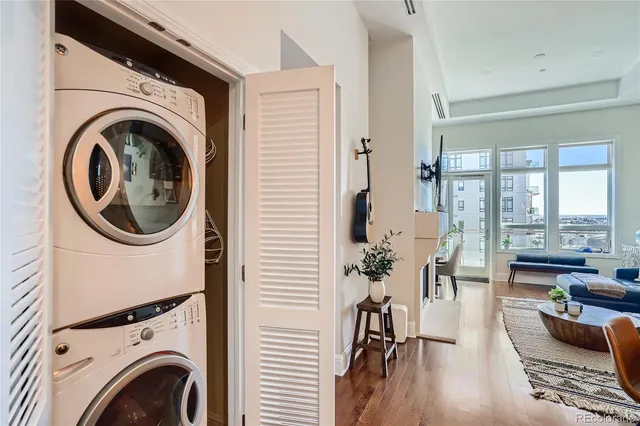 a view of a hallway with washer and dryer