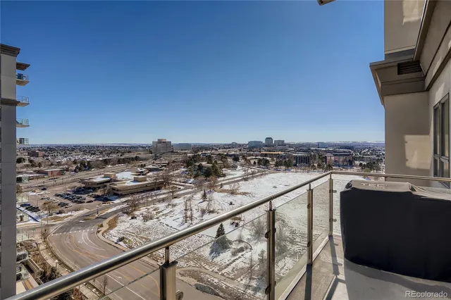 a view of a balcony with an ocean view