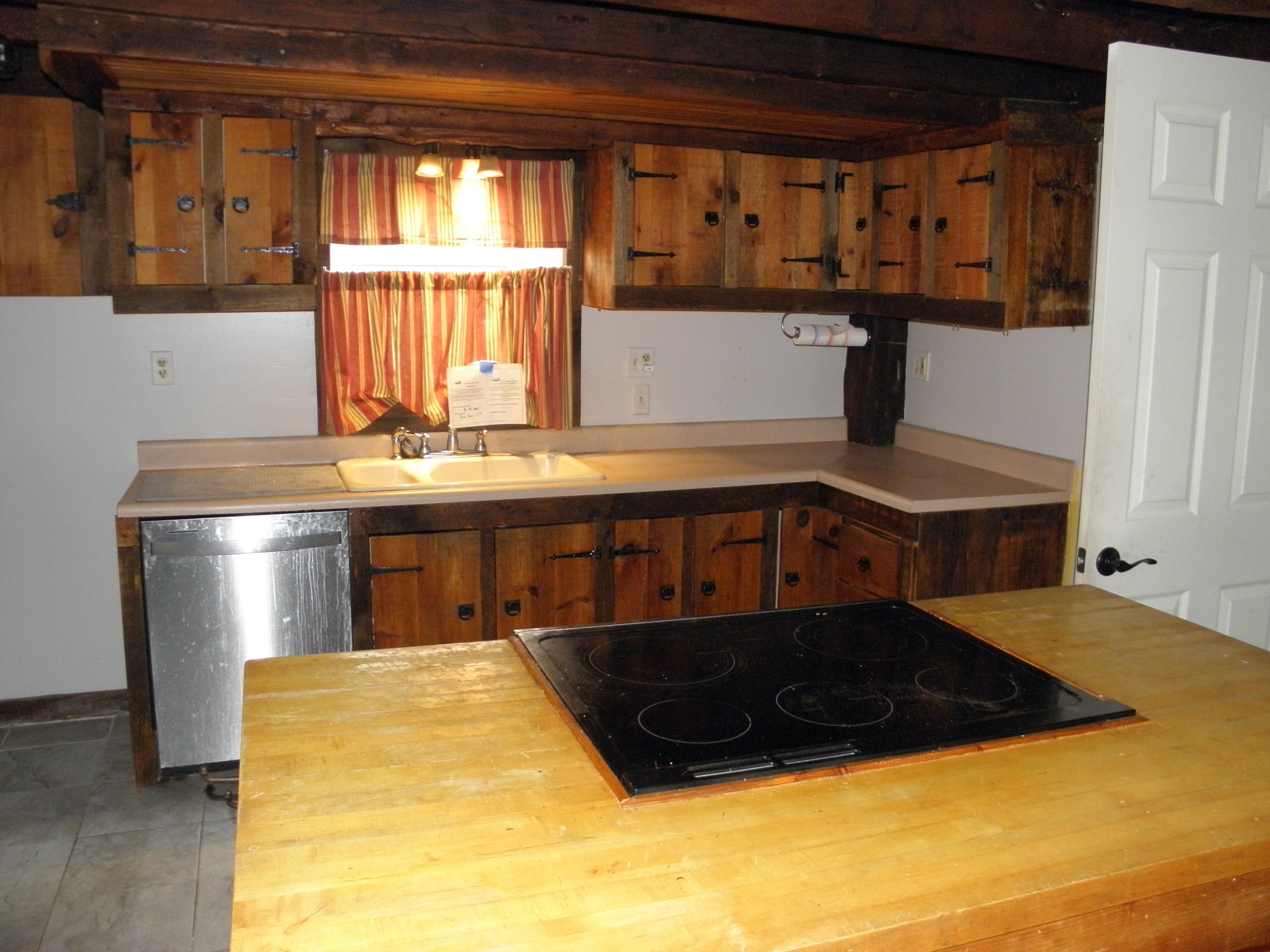 29 Union Street Plainfield, CT 06354 - Photo 5 of 12 a bed sitting in a kitchen next to a window