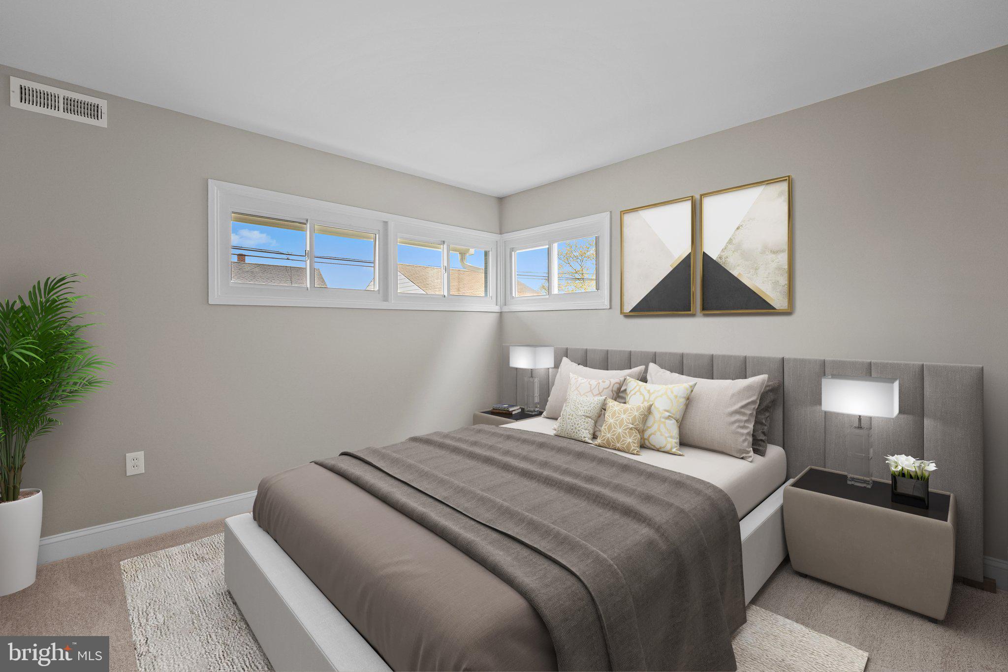 16 Granite Road Levittown, PA 19057 - Photo 4 of 27 a bedroom with a bed and a painting on the wall