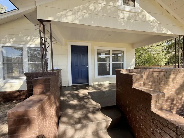 a view of a porch with furniture
