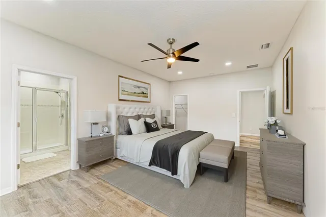 an empty room with wooden floor and closet
