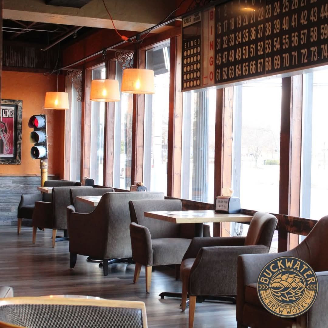 213 East Main Street Carbondale, IL 62901 - Photo 13 of 17 a view of a dining room with furniture window and outside view