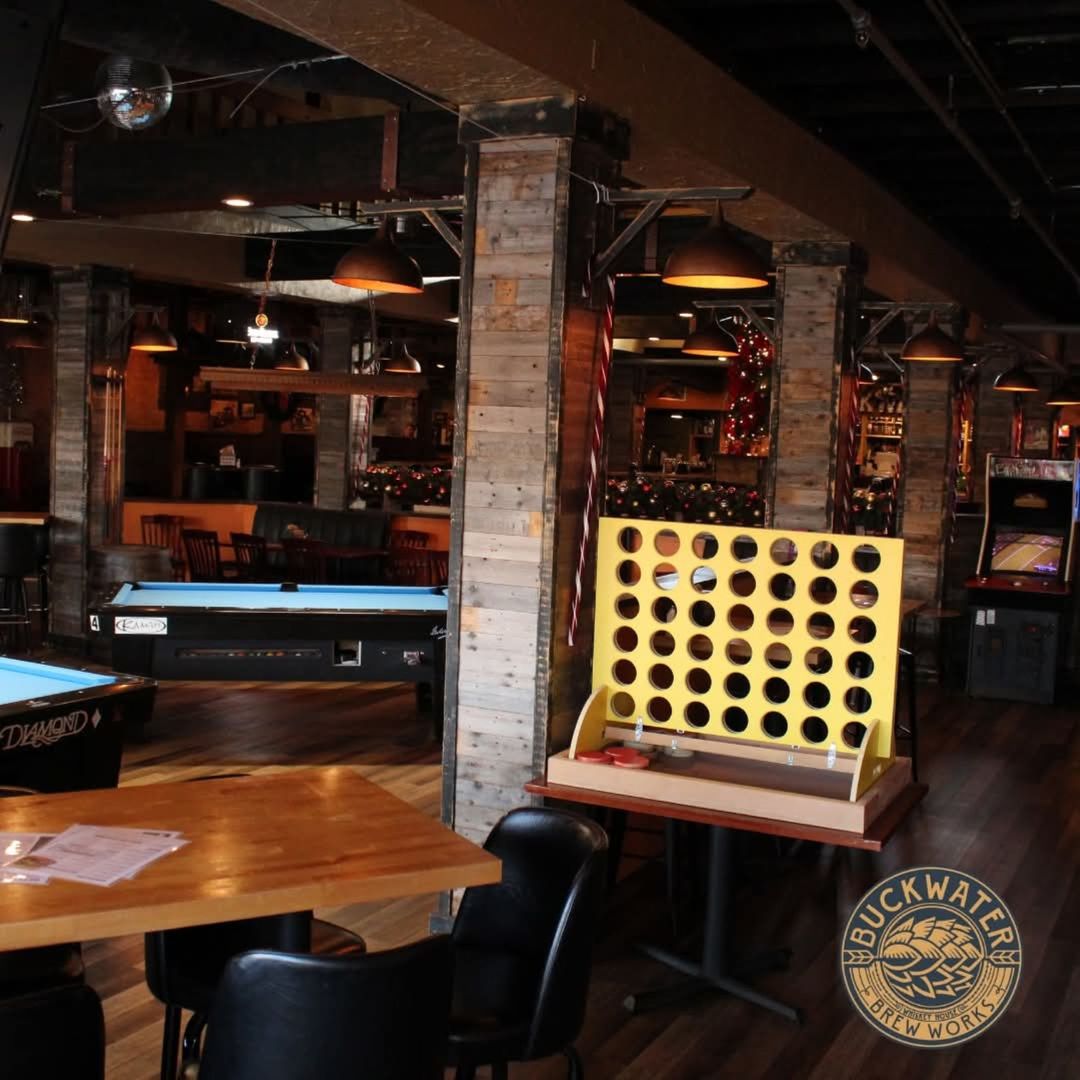 213 East Main Street Carbondale, IL 62901 - Photo 10 of 17 a table and chairs in front of a room