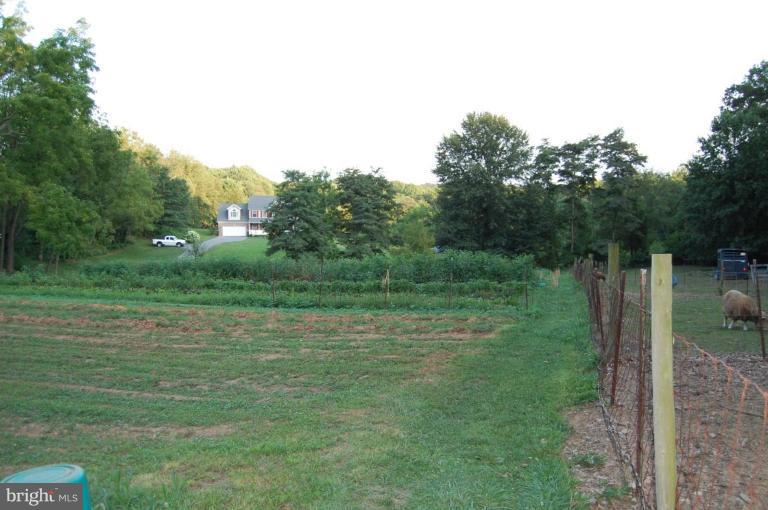 2367 Carrollton Road Westminster, MD 21157 - Photo 3 of 22 a backyard of a house with lots of green space