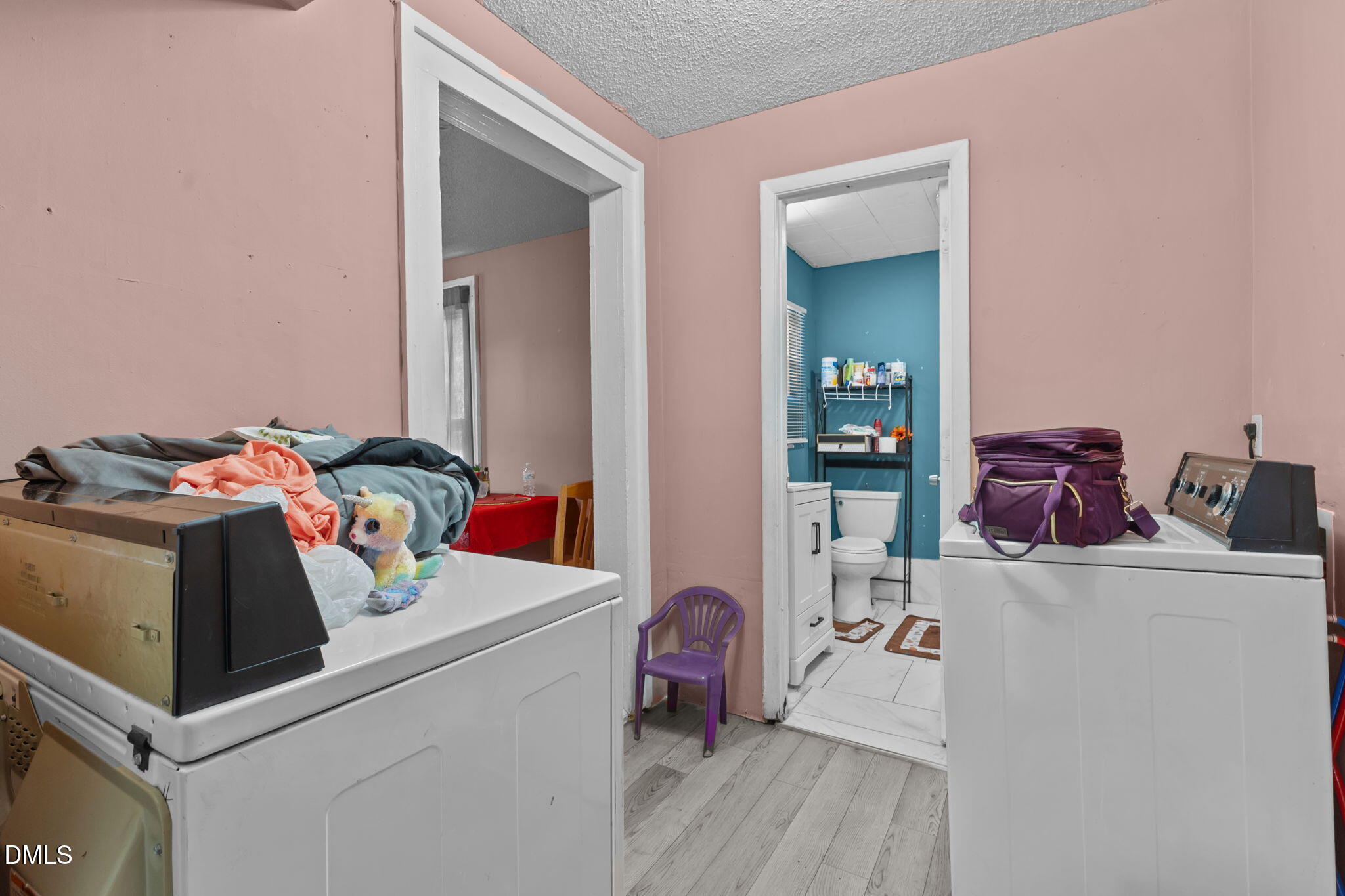 300 Devane Street Clinton, NC 28328 - Photo 11 of 39 a room with furniture and wooden floor