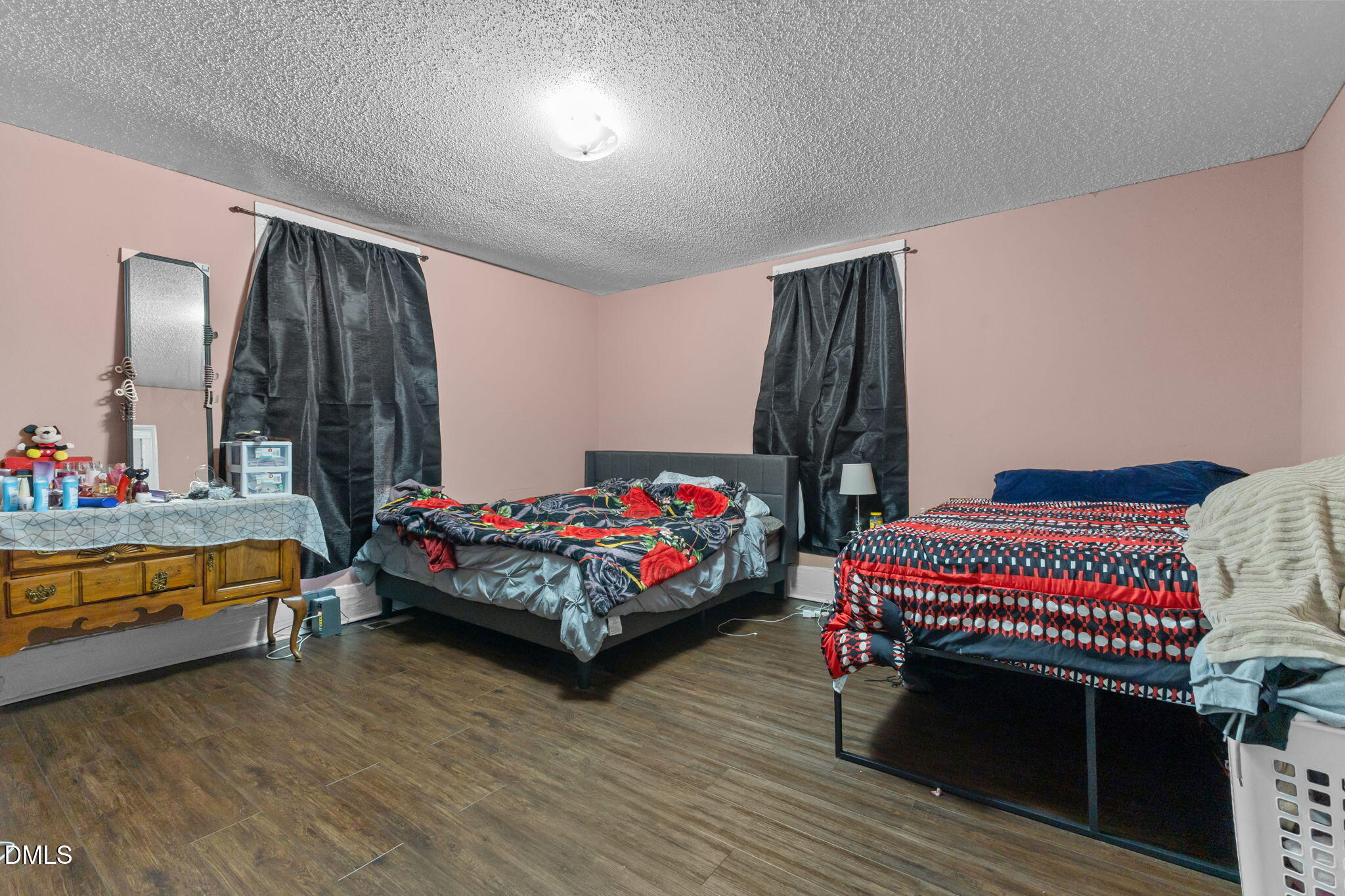 300 Devane Street Clinton, NC 28328 - Photo 12 of 39 a bedroom with a bed and a dresser