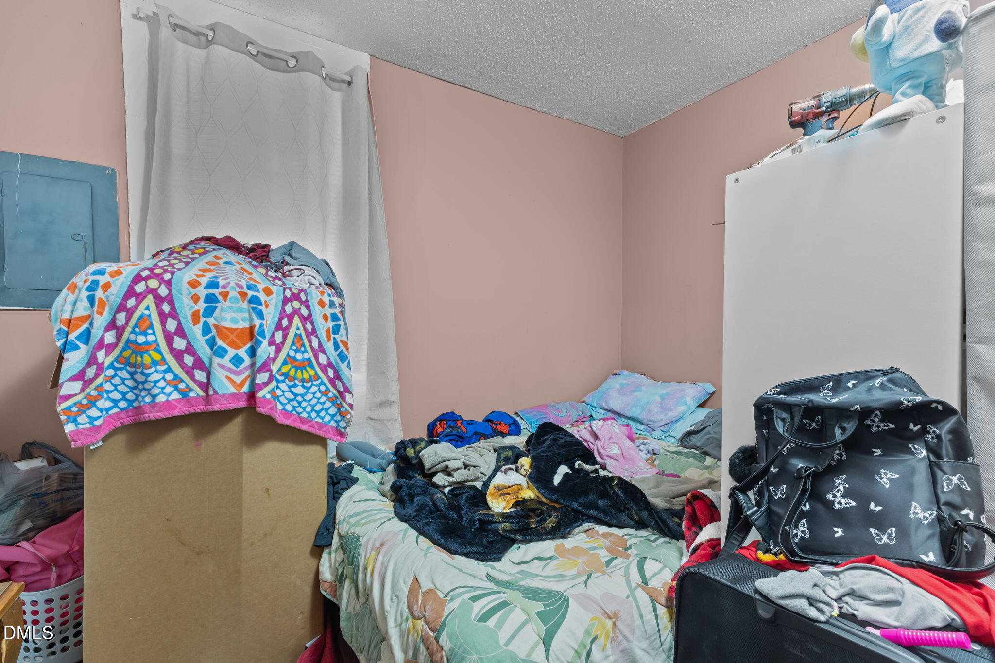 300 Devane Street Clinton, NC 28328 - Photo 16 of 39 a bedroom with a bed and a small closet