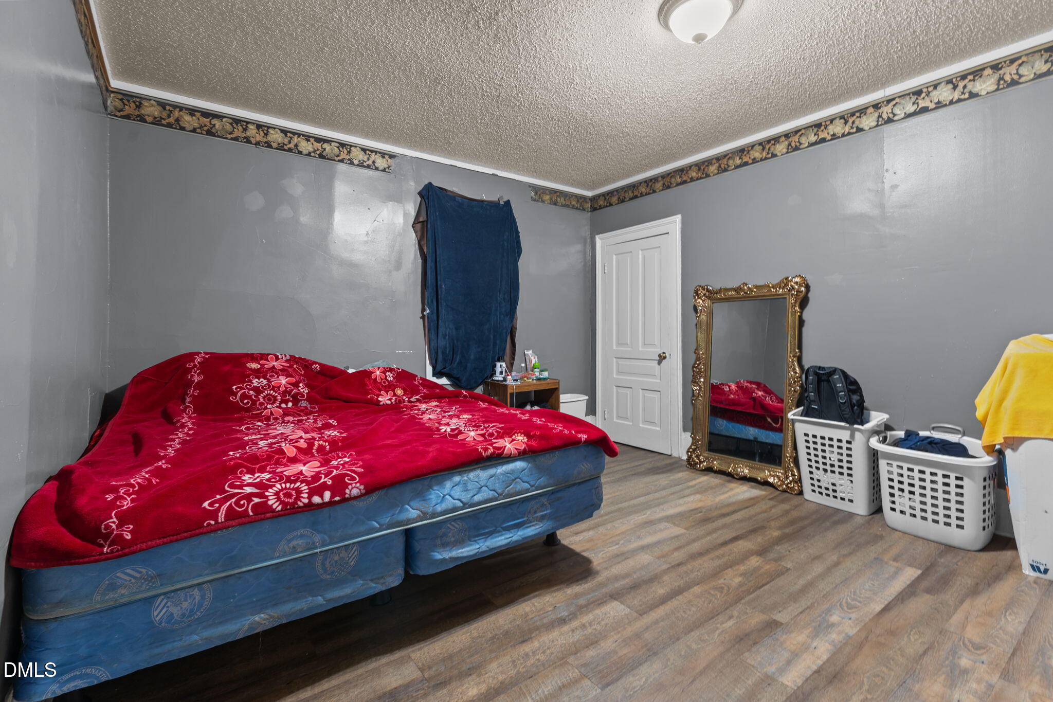 300 Devane Street Clinton, NC 28328 - Photo 31 of 39 a bedroom with a bed closet and a window