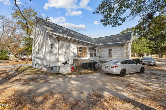 a view of street with parked cars