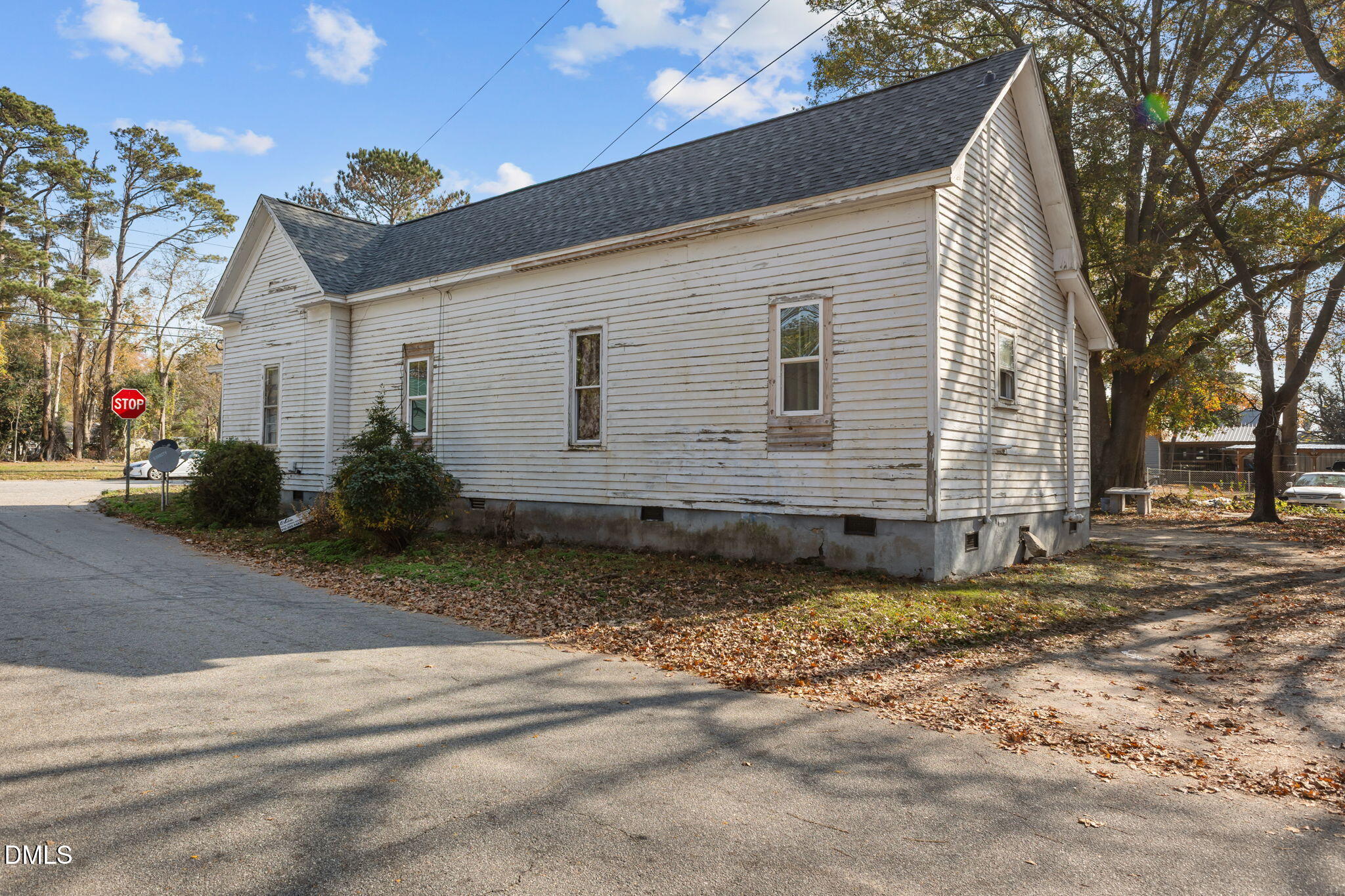 300 Devane Street Clinton, NC 28328 - Photo 35 of 39 a view of a house with a yard