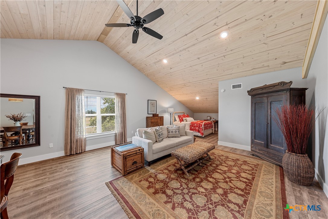 1006 County Road 280 Cameron, TX 76520 - Photo 40 of 48 a living room with furniture and a flat screen tv