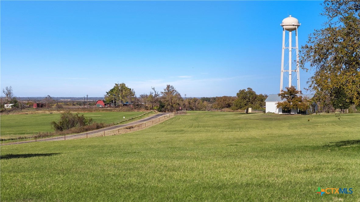 1006 County Road 280 Cameron, TX 76520 - Photo 7 of 48 a view of a golf course with an ocean