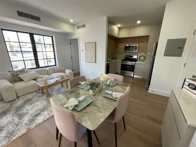 a view of a dining room with furniture