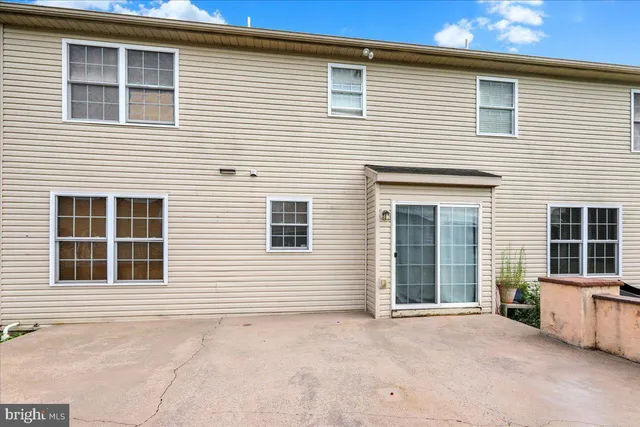 a view of a house with white door